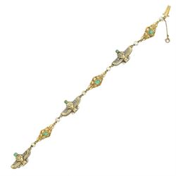 Early 20th century French 18ct gold Egyptian Revival bracelet, three winged sphinx motif p...