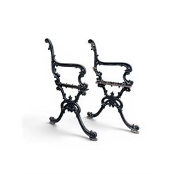 Carron Foundry - two pairs of 19th century cast iron garden bench ends, ornate detail with arms and X shaped legs,finish in black paint, the design no. 110396, first registered 13 July 1857 (see illustration), width as desired