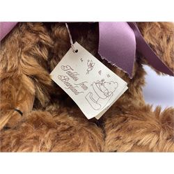 Group of five teddy bears comprising ‘George’ a unique pellet filled bear with glass eyes and velvet paws H38cm, and ‘Abbey’ a luxury German plush with wobble head and glass eyes no.5/10 H24cm, both with Teddies from Bearyland labels; along with two light blonde mohair H. M. Bears and Boyds Bears ‘T. F. Wuzzies’ no. 595140 (5)