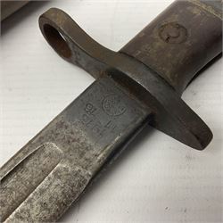 WWI Remington Pattern 1913 bayonet, the 43cm fullered blade with various marks to the ricasso including date code 11 16; in leather covered scabbard with various stamps including JWB 17 L58cm overall; and a French Model 1866 sabre bayonet (no scabbard)