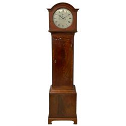 John Mudge of London – mahogany 8-day longcase clock with a break arch top c 1800, shallow cornice surround and circular glazed hood door, trunk with reeded, canted corners and wavy topped trunk door, square plinth raised on bracket feet,  silvered sheet dial with engraved Roman numerals, five-minute Arabic’s and minute track, with pierced steel hands and seconds dial, two train rack striking movement with a recoil anchor escapement. With weights and pendulum.