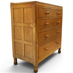 Mouseman - early-to-mid 20th century adzed and panelled oak chest, raised back over rectangular adzed top with canted corners, fitted with two short over three long drawers with turned knob handles, raised on octagonal feet, with carved mouse signature, by the workshop of Robert Thompson of Kilburn