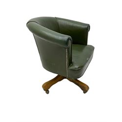 20th century swivel office chair, upholstered in green leather with rolled arms and stud band, on four spoke beech base with castors