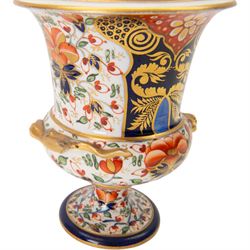 Derby twin handled campagna urn, decorated with flowers and cobalt panels highlighted in gilt, together with a smaller example with similar decoration, tallest H20cm