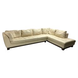 Roche-Bobois - large corner sofa, upholstered in ivory leather with buttoned seat cushions, raised on a stained beech base with bracket feet