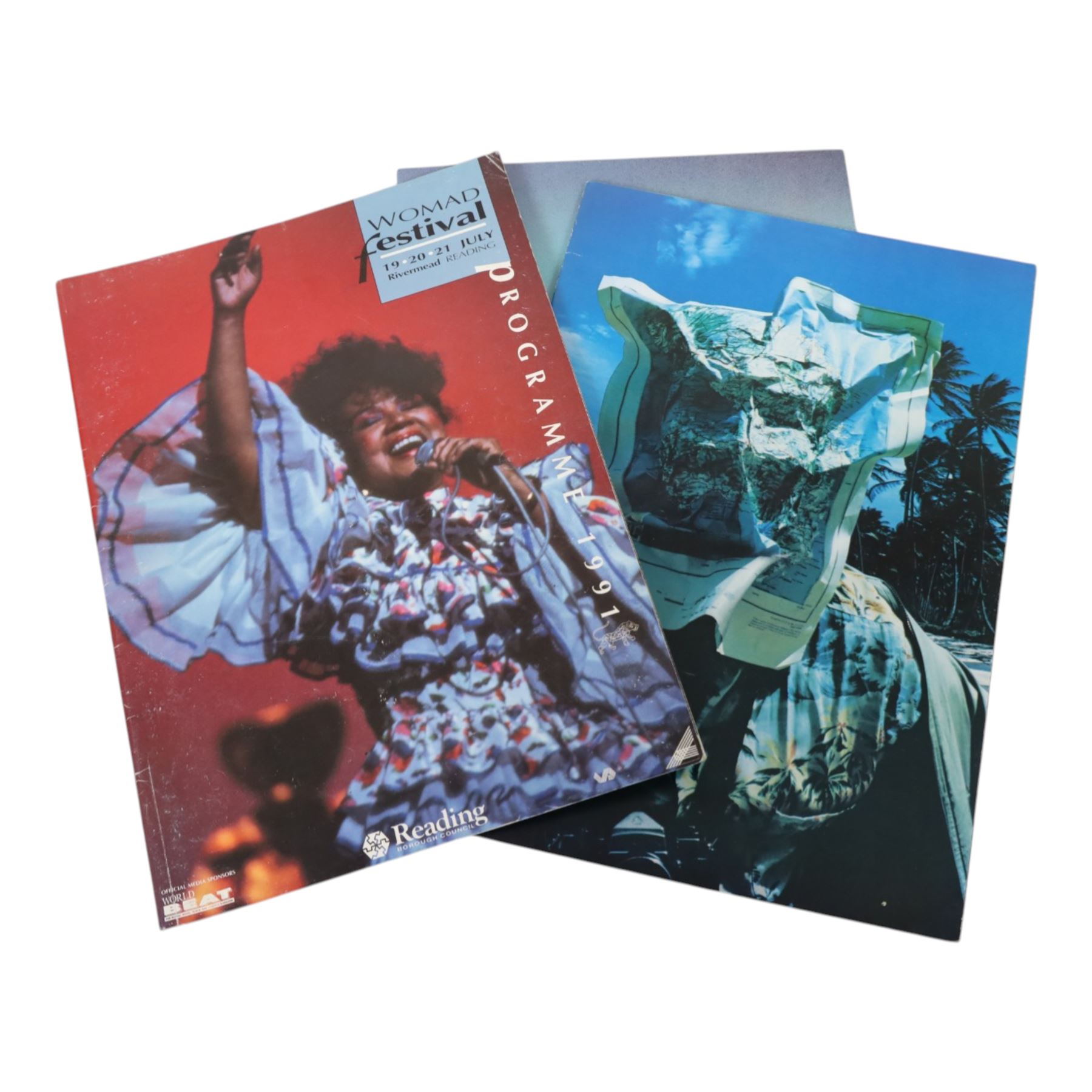 Music memorabilia, including cardboard globe, a free gift with the Wings Over America vinyl, music programmes, including Concert for George, Paul McCartney World Tour, Wings programmes, Glastonbury 1986, 10CC programmes, Knebworth Fair 1976 programme, etc