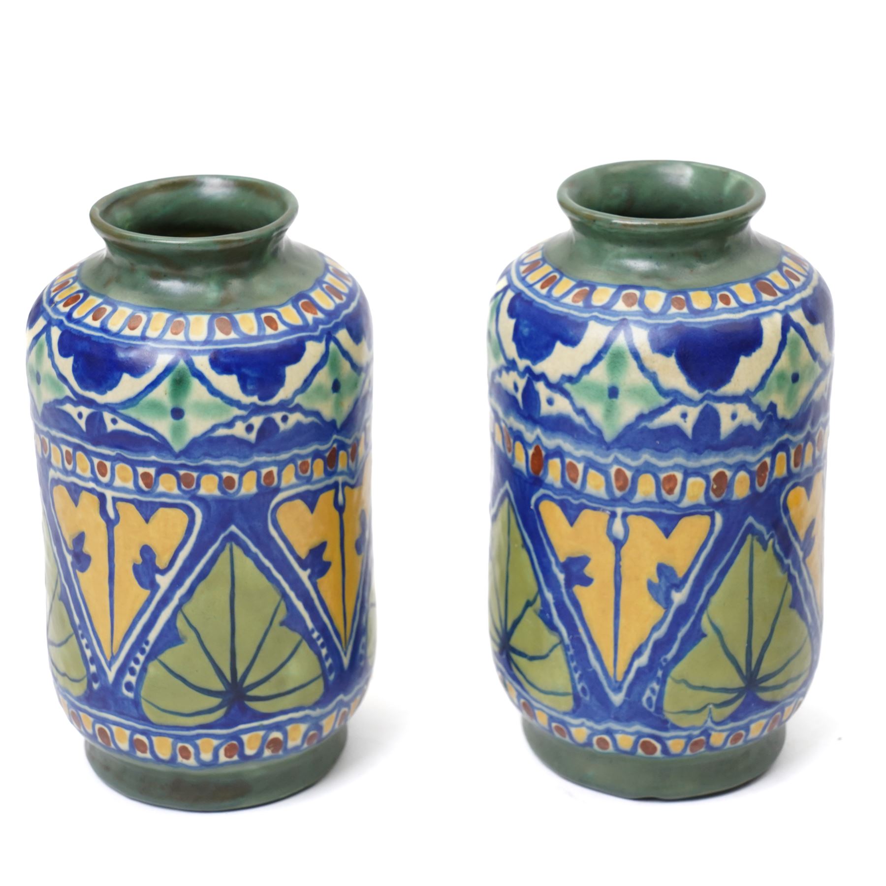 Thomas Forrester & Son Trogon Ware vase, c1920-1930, of baluster form with bulbous neck, painted with a band of peacocks, signed, H21cm; together with a pair of vases designed by James Plant, signed to base, H19cm, a Herman August Kahler (Danish 1846-1917) vase, of elongated form, signed to base, H29cm, and two further vases (6)