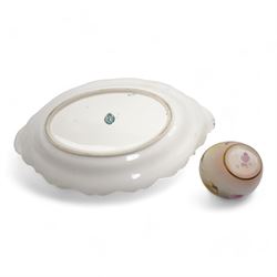 Early 20th century Royal Worcester twin handled dish, painted with roses and buds, within a green and gilt moulded border, signed by J. Lander, L31cm, together with a Royal Worcester vase hand painted with roses, no. 2491, unsigned (2)