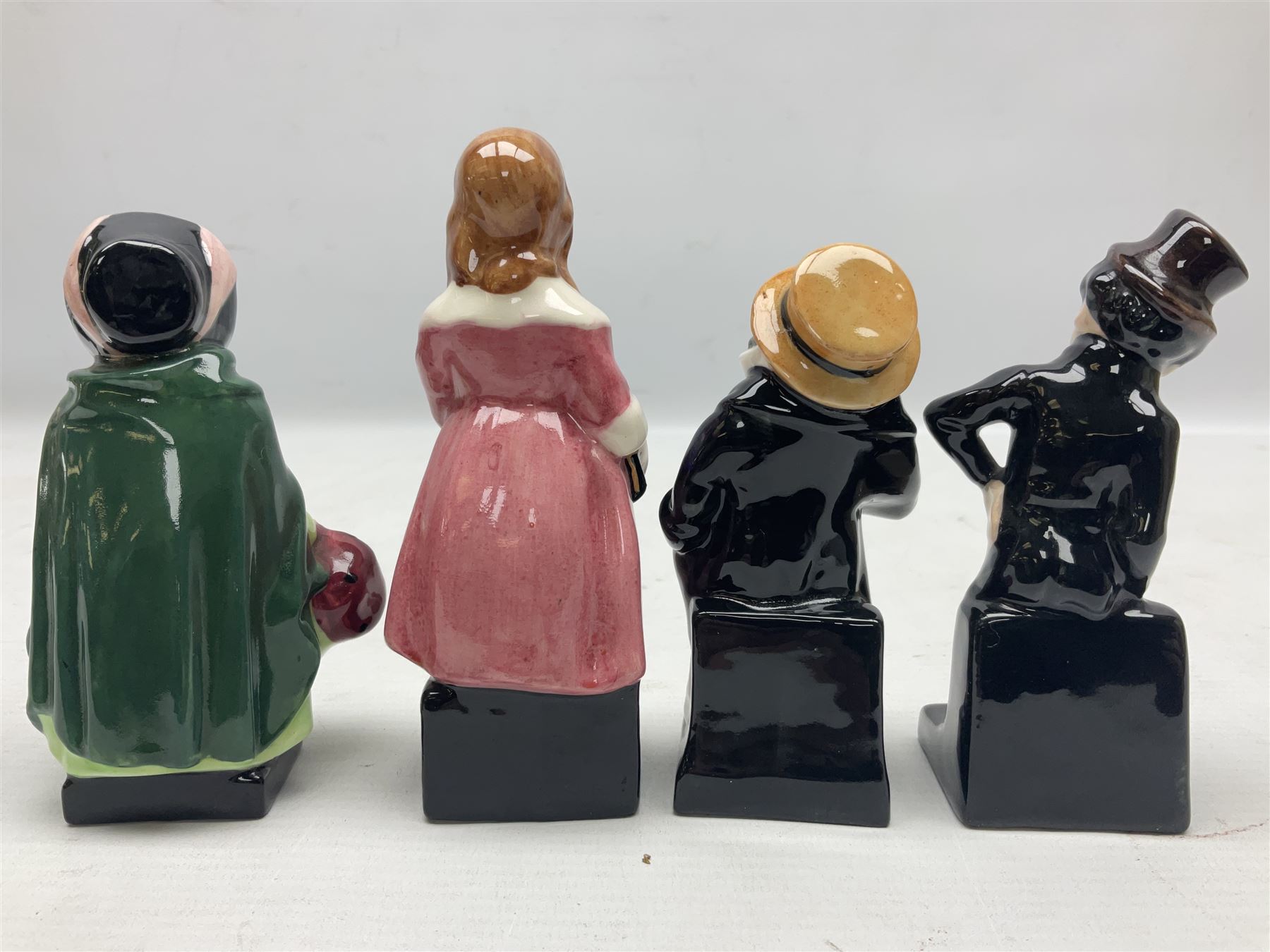 Seventeen Royal Doulton Charles Dickens figures, to include Bumble, Sairey Gamp, Scrooge, Dick Swiveller, Little Nell etc, all with printed marks beneath