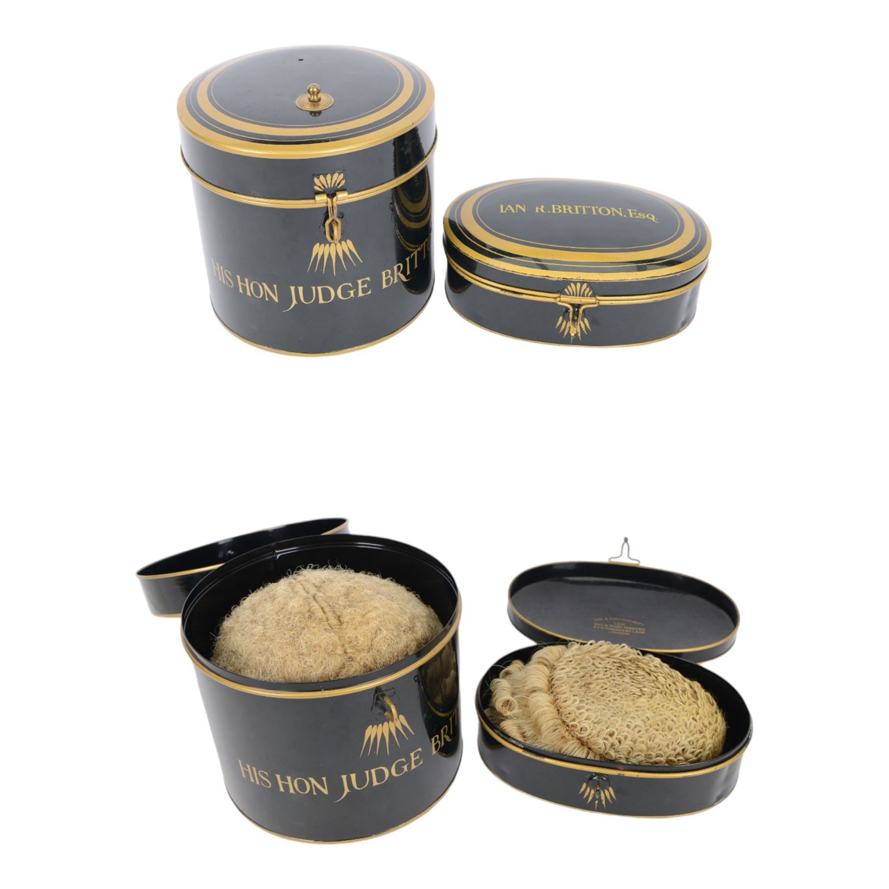 Ede & Ravenscroft two barrister/ judge horsehair wigs in fitted tins by 'Ede & Ravenscroft Law Wig & Robe Makers 93/4 Chancery Lane, London, inscribe upon the tins 'Ian R.Britton.Esq' and His Hon Judge Britton, together with judges robe 