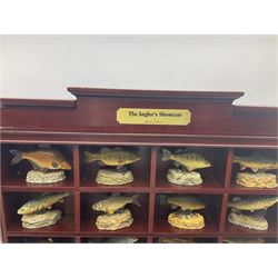 Twenty Four Danbury Mint models of fish, The Angler's Showcase, each with accompanying information card, in wooden wall mounted display shelf, with title plaque, display shelf H61cm L54cm
