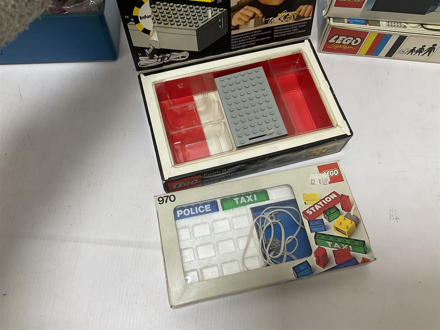 Fischer Technik/Lego/Playmobil - thirteen model building sets comprising eight Fischer Technik sets 50, 50/1, 50v, 50/2, 50+mot1 and two 50S, 50/1 add-on pack, with spare parts packs 01, 03, 05, two 22 and 30; two Lego sets comprising C107 and Lego Systems 103, part-set 870 and 970; Playmobil no.3520 set; four boxes of loose lego, various instruction manuals and a scrapbook 