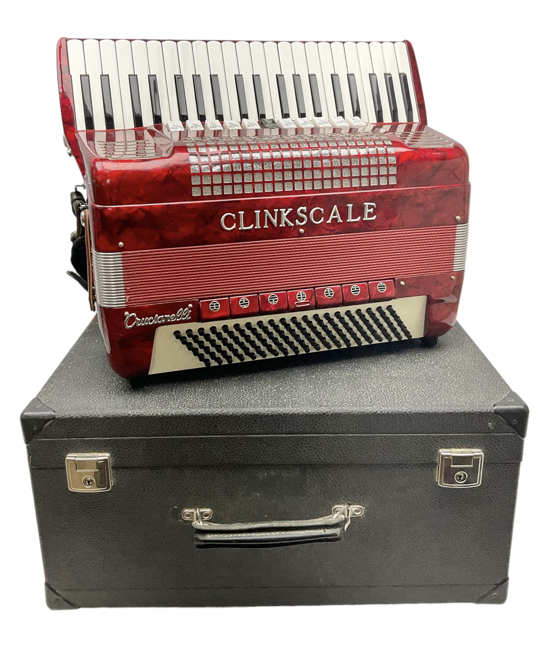Clinkscale Crucianelli piano accordion in red pearline case with one-hundred and twenty buttons and forty-one keys L52cm; in carrying case