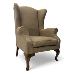 Hardwood-framed wingback armchair, upholstered in dog tooth pattern fabric, on cabriole supports 