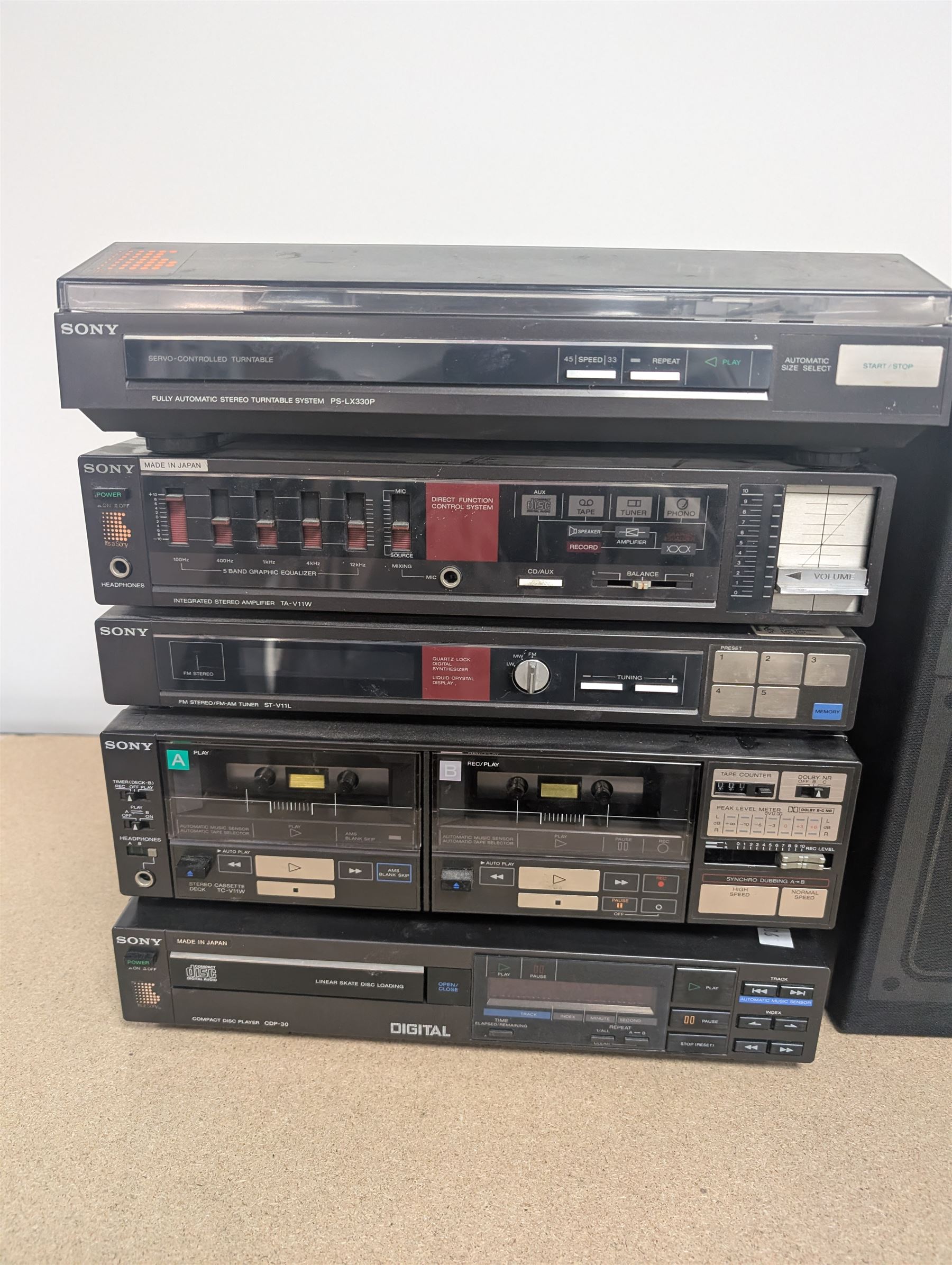 Sony HiFi system, comprising PS-LX330P Turntable, CDP-30 CD Player, TA-V11W Amplifier, ST-V11L FM-AM Tuner, TC-V11W Cassette Player and a pair of SS-V11 16cm 2Way Woofer Speakers
