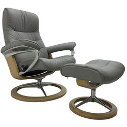 Stressless by Ekornes - 'Large Opal Siganture' reclining armchair with matching footstool, upholstered in stitched grey leather