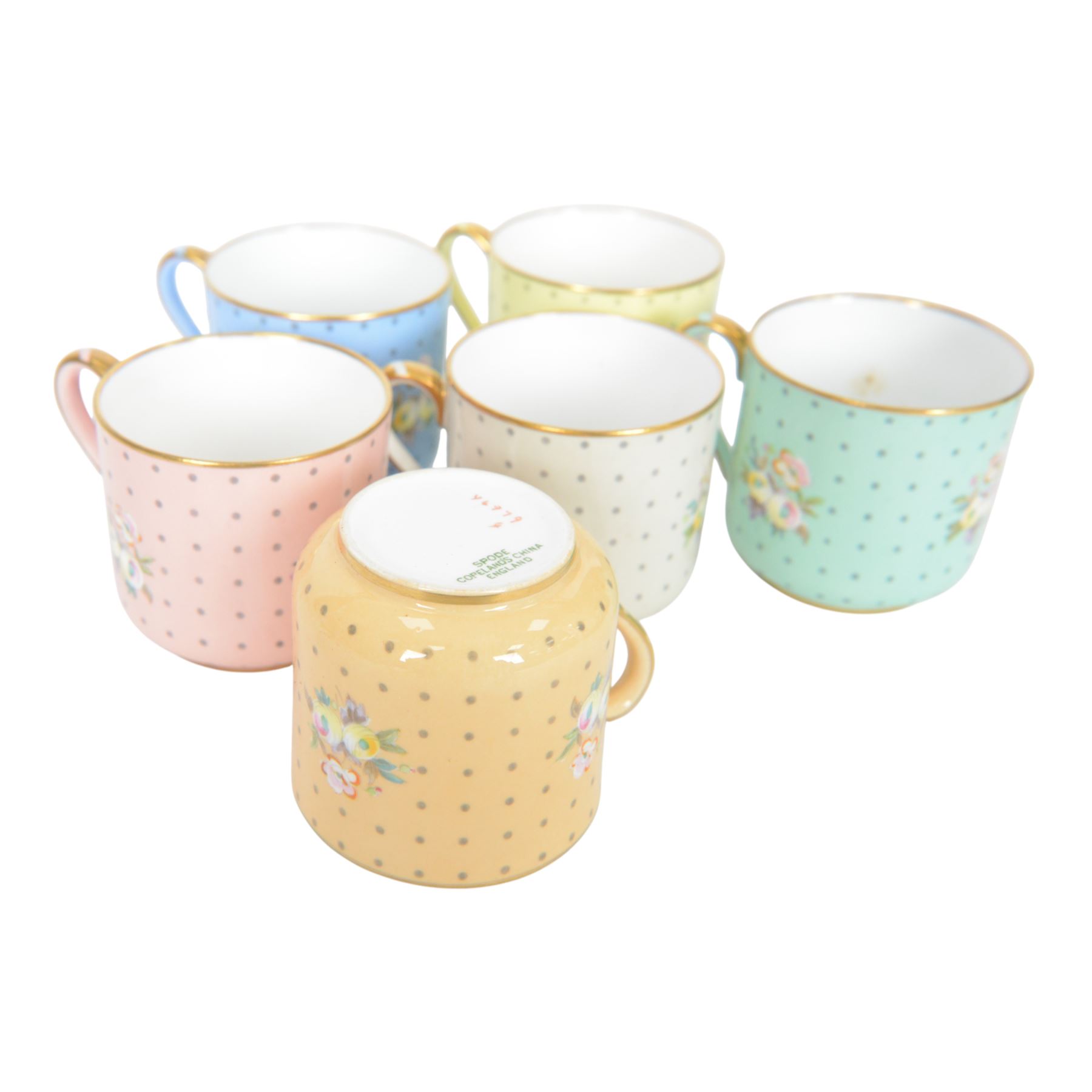 Spode six coffee cups and saucers cased set, decorated with floral sprigs on a polka dot ground with gilt detail