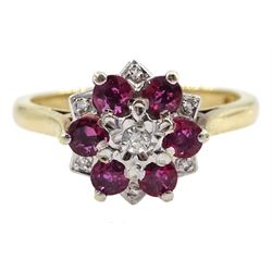 9ct gold round brilliant cut diamond and garnet cluster ring, London 1975