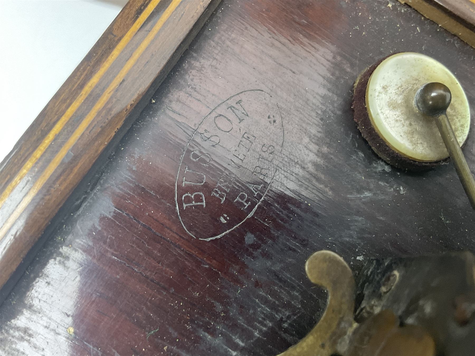 19th Century inlaid rosewood Flutina accordion, stamped Busson of Paris, having sixteen mother of pearl keys and six fold floral decorated bellows L30cm; in baize lined mahogany box