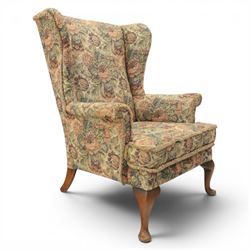 Parker Knoll - pair of mid-20th century wing back armchairs, upholstered in tapestry fabric, raised on cabriole legs