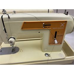 Vintage Brother electric sewing machine in case together with a Frister and Rossmann model 45 sewing machine in case