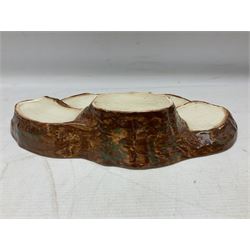 Seven Beswick Beatrix Potter figures, comprising Sally Henny Penny, Johnny Town-Mouse, Mrs Tiggy-Winkle, Mrs Tittlemouse, Tom Kitten, Pig-Wig and Squirrel Nutkin, together with a Beswick tree trunk display stand, stand L30cm