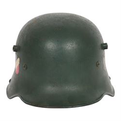 German double decal  M16 helmet with tricolour decal to the right and army eagle to the le...