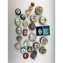 A group of various pill and trinket boxes, to include Limoges and other Continental examples, a number decorated to the hinged covers with printed figural scenes, others decorated with flowers, etc., plus a miniature table and chair with similar figural decoration, and a boxed Bilston & Battersea Enamels box. 
