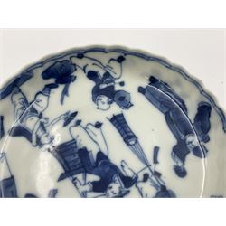18th century Chinese blue and white Kangxi teacup and saucer, decorated with dancing figures, four character Kangxi mark beneath, saucer D10cm