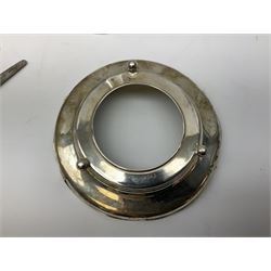 1920's silver stand, hallmarked Birmingham 1922, together with two tall faceted clear glass dressing table jars with hallmarked silver covers, and cut glass vase with hallmarked silver mounted collar, and small group of silver handled accessories, including files, picks, etc., approximate total silver weight 58.8 grams