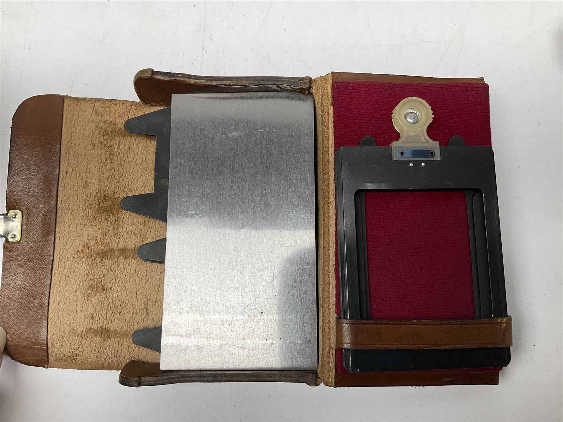 Arriflex 16SB camera body, serial no. 1784, with ' Carl Zeiss Distagon 1:2 f=8mm' lens, serial number 3860224, 'Carl Zeiss Jean Tessar 2/16' lens, serial no 3624355, camera pistol grip and other accessories, in fitted hard case