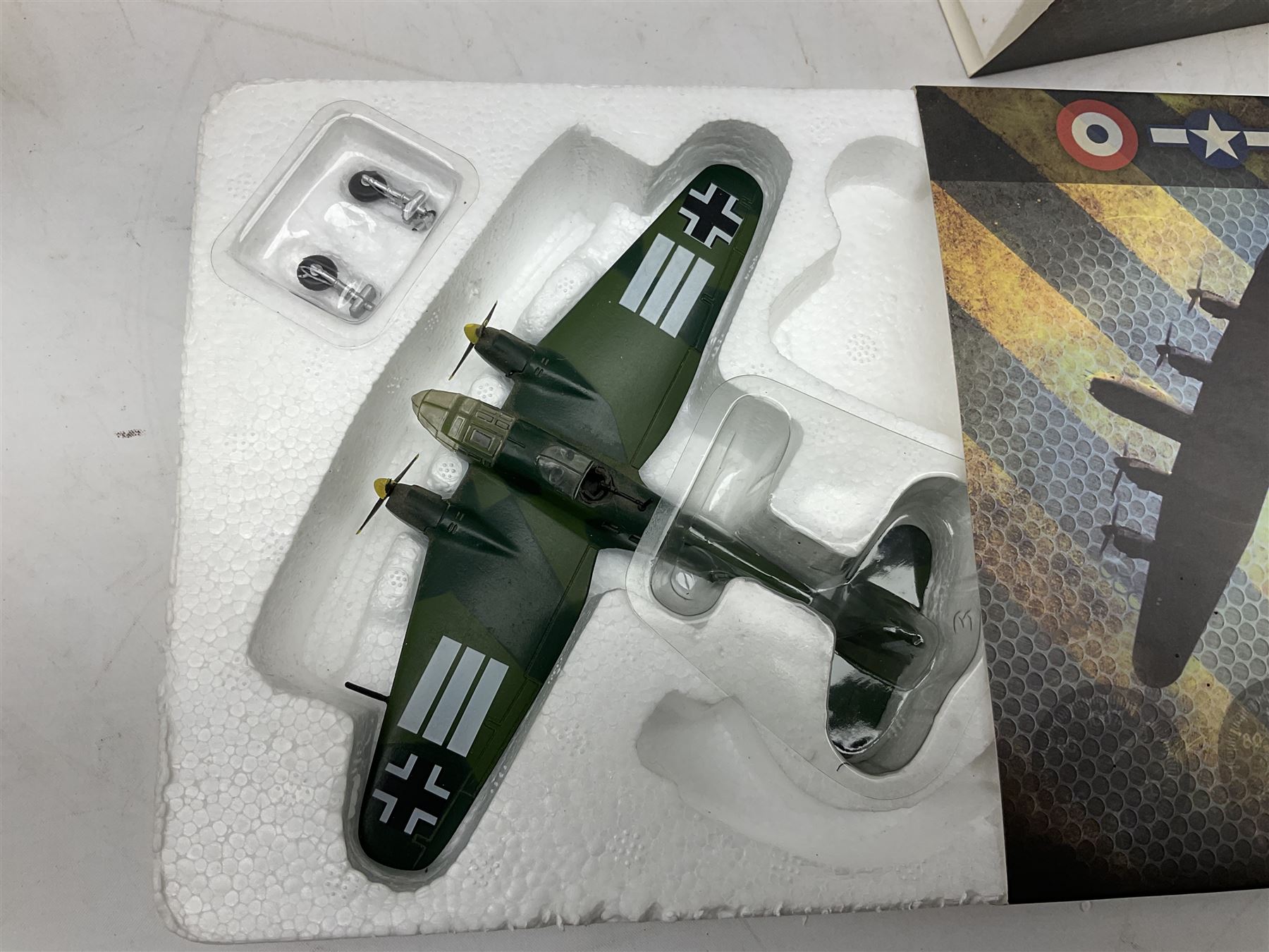 Nineteen Atlas Editions die-cast models of aircraft; to include Douglas Dakota C-47, Forke Wulf, Handley Page Halifax, De Havilland DH-98 Mosquito Mk.IV, etc and two others similar by IXO Models; all boxed (21)

