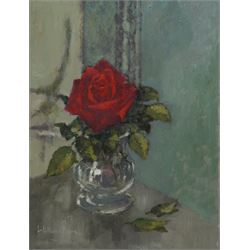 William Burns (Northern British 1923-2010): 'Still Life - Rose', oil on board signed, titled verso 34cm x 27cm (unframed)
Provenance: Direct from the family of the artist. 
Notes: Born in Sheffield in 1923, William Burns RIBA FSAI FRSA studied at the Sheffield College of Art before the outbreak of the Second World War, during which he helped illustrate the official War Diaries for the North Africa Campaign, and was elected a member of the Armed Forces Art Society. On his return, he studied architecture at Sheffield University and later ran his own successful practice, being a member of the Royal Institute of British Architects. However, painting had always been his self-confessed 'first love', and in the 1970s he gave up architecture to become a full-time artist, having his first one-man exhibition in 1979.