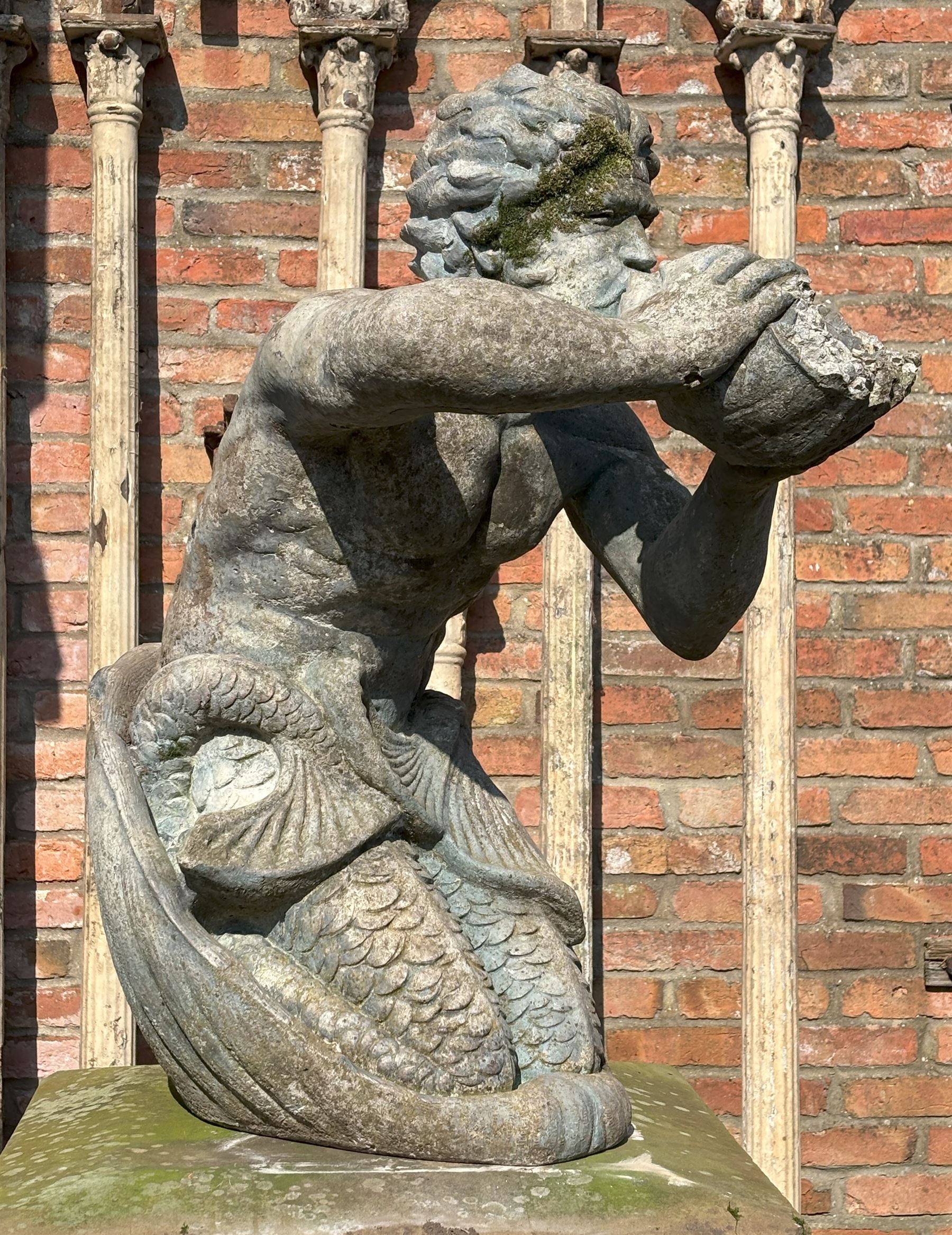 Reconstituted stone garden statue water fountain modelled as Triton, mid 20th century, in characteristic pose. H85cm - COLLECTION BY APPOINTMENT FROM: The White House, Thirsk Road, Easingwold, York, YO61 3NF - CALL 01723 507111 TO ARRANGE