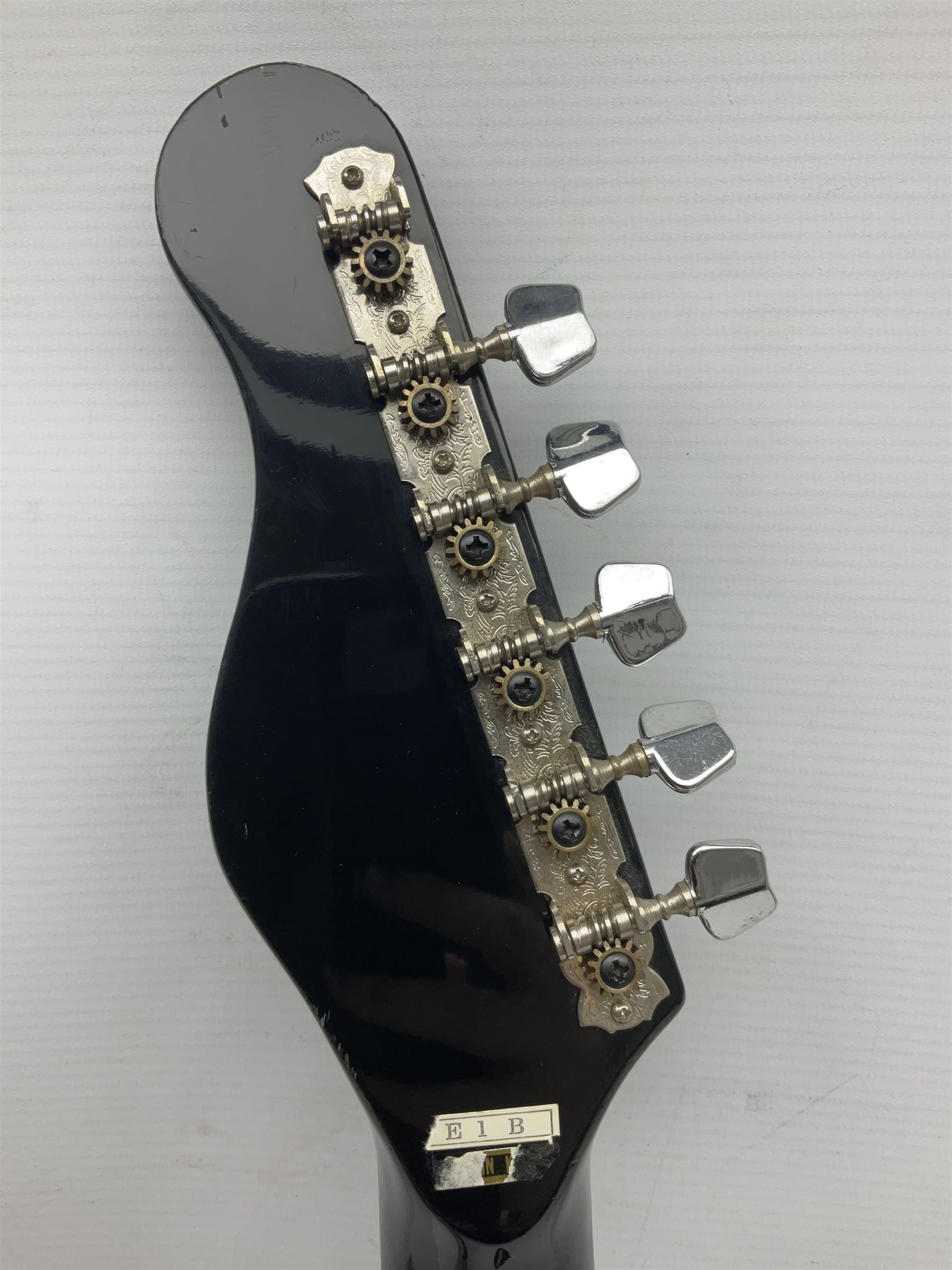 Encore black electric cut-away guitar L96cm; and Spanish Victor Garcia model 187 acoustic guitar, bears label dated 1972 L99cm; each in soft carrying case (2)