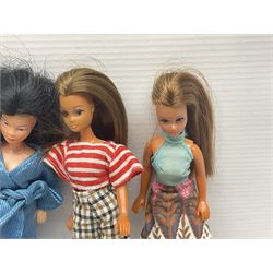 Seven Pippa dolls and a collection of plastic dolls house furniture