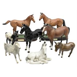 Collection of Beswick horse figures, to include Red Rum on a wooden plinth,  Lammtarra on oval plinth, Morgan Horse Black and three others, together with Royal Daulton Appaloosa Foal and a USSR horse