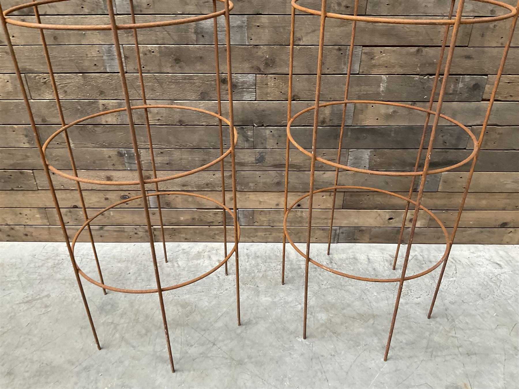 Pair of Country House wrought iron garden obelisks with ball finial, raise in four tiers