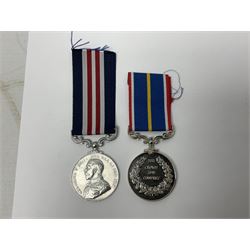 Gaunt & Son Territorial Force Nursing Service cape medal; cased; WW1 British War Medal and 1914-15 Star (names erased); two MID oak leaves; Polish and American medals; eight replica medals including VC, MM, Air Crew Europe Star etc and replica group of five WW2 miniatures etc