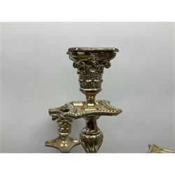 Large silver plated four branch candelabra, with beaded square stepped base leading to a fluted column with Corinthian capital, supporting four scrolling branches with Corinthian sockets removable nozzles and beaded drip pans, surrounding a central conforming sconce, nozzle and drip pan, overall H64cm