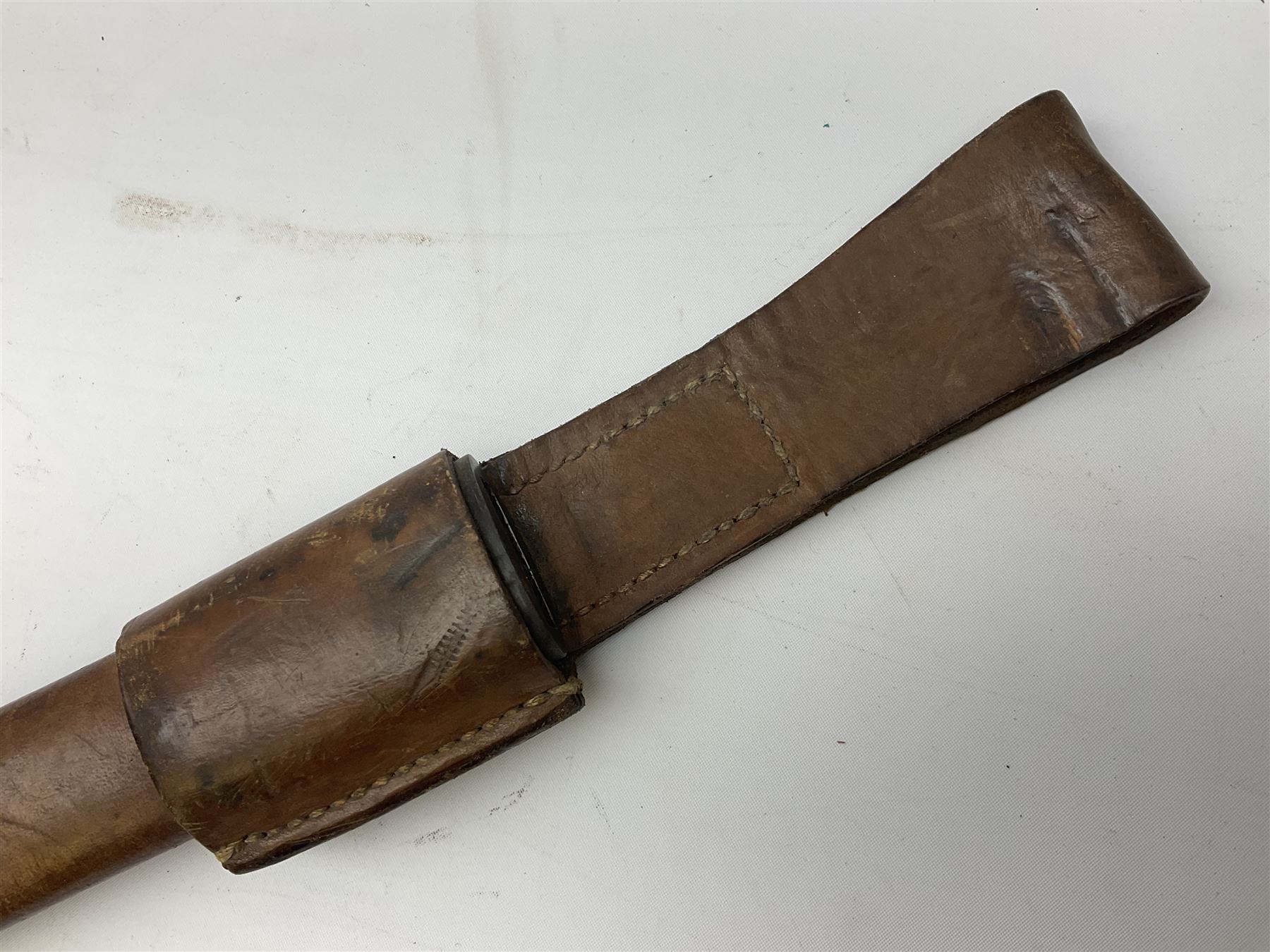 WW1 American Remington P14 rifle bayonet Model 1913, the 43cm fullered steel blade dated 5 17; in metal mounted leather scabbard L57cm overall; and WW1 Canadian Ross Rifle Co.1907 Model Mk.II bayonet, dated 2/17; in leather scabbard with frog (2)