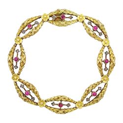 Late 19th / early 20th century French 18ct gold ruby and diamond fancy link bracelet, each laurel wreath link with a round cut ruby and two diamond chips either side and separated by a flower head, French horse's head hallmark