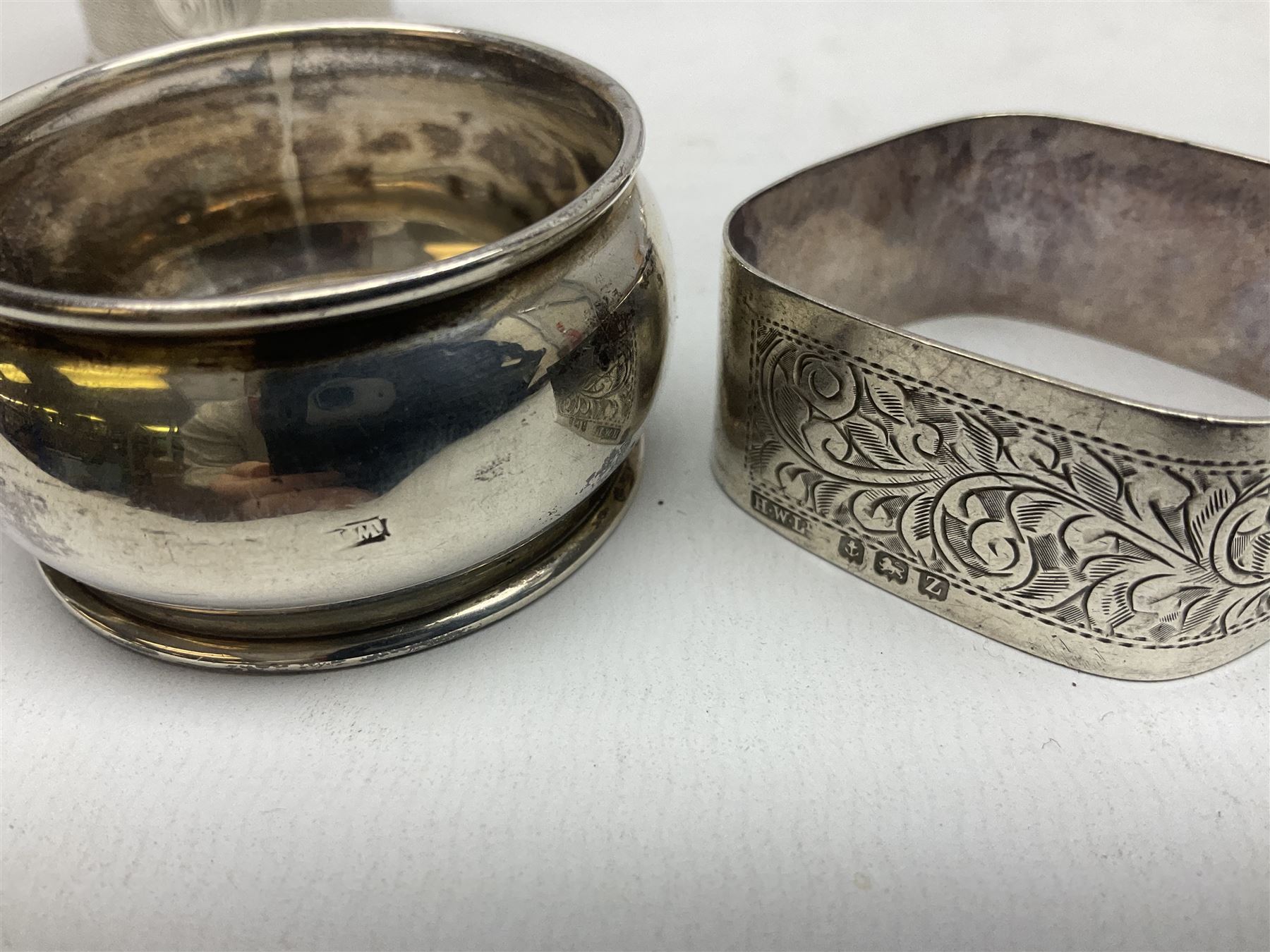 Group of silver to include cased set of six silver handled knives hallmarked Birmingham 1921 by Raeno Silver Plate Co, three hallmarked napkin rings etc together with silver plated and other metalware etc