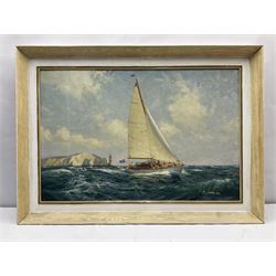 Tom Lowery (20th century): Racing Yacht 'Phylene' off the Needles Isle of Wight, oil on canvas covered board signed and dated 1968, titled verso 49cm x 75cm