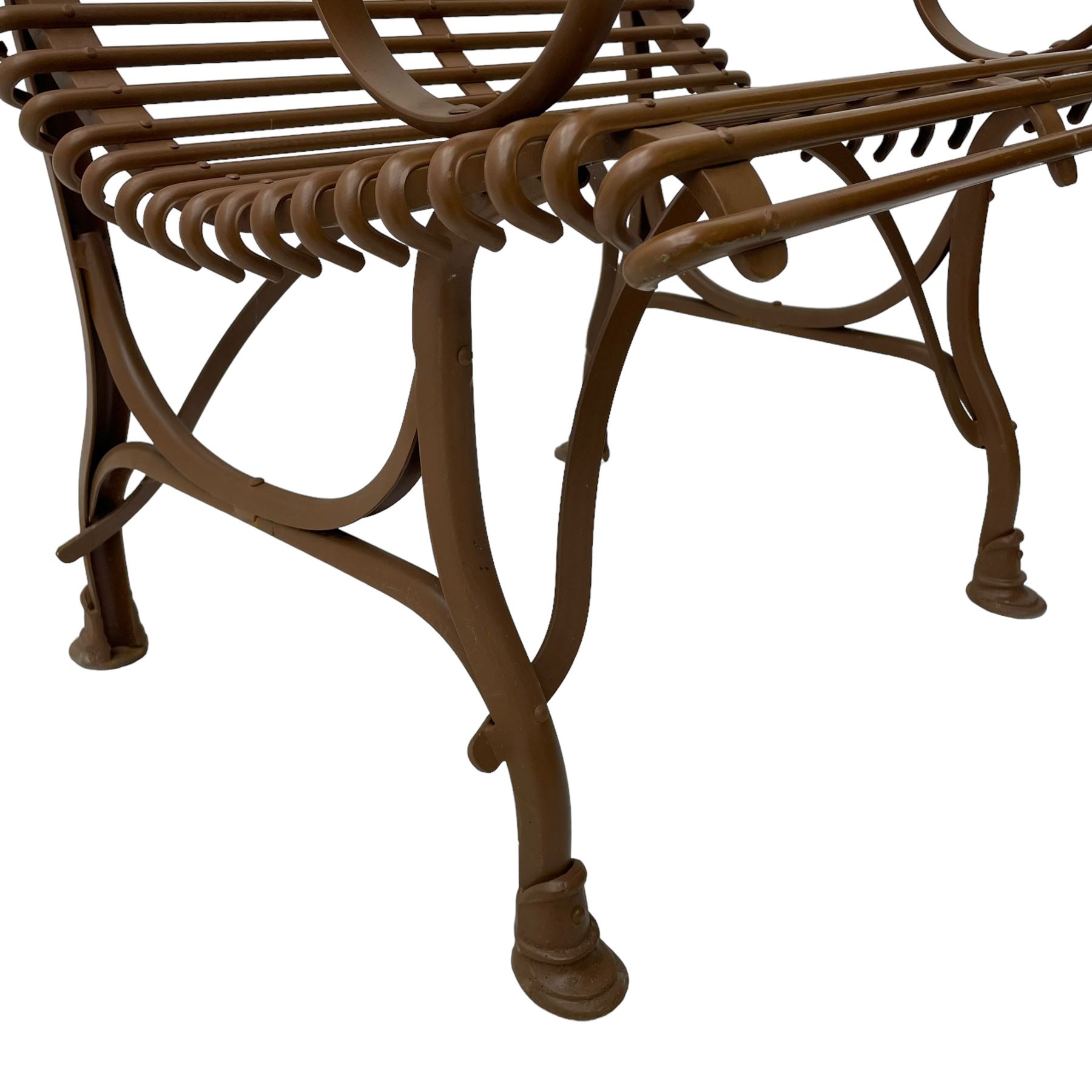 Painted wrought metal 'Arras' chair, curved frame with horizontal rails and scrolled arms, on hoof feet, in russet brown paint finish, with brass plaque 'Usine, S. Sauveur, Arras' 