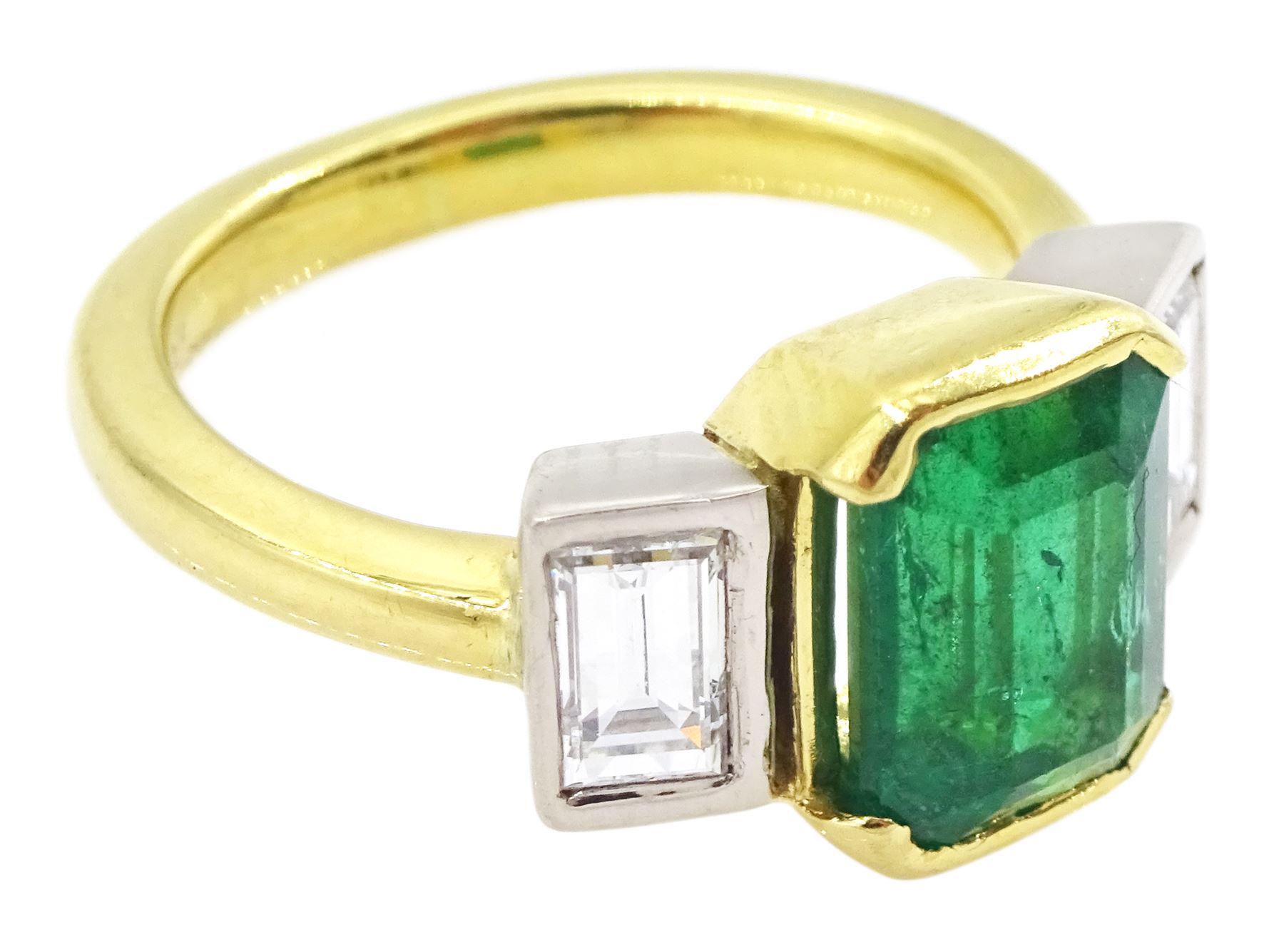18ct gold three stone octagonal cut emerald and baguette cut diamond ring, hallmarked, emerald approx 2.60 carat total diamond weight approx 1.00 carat
