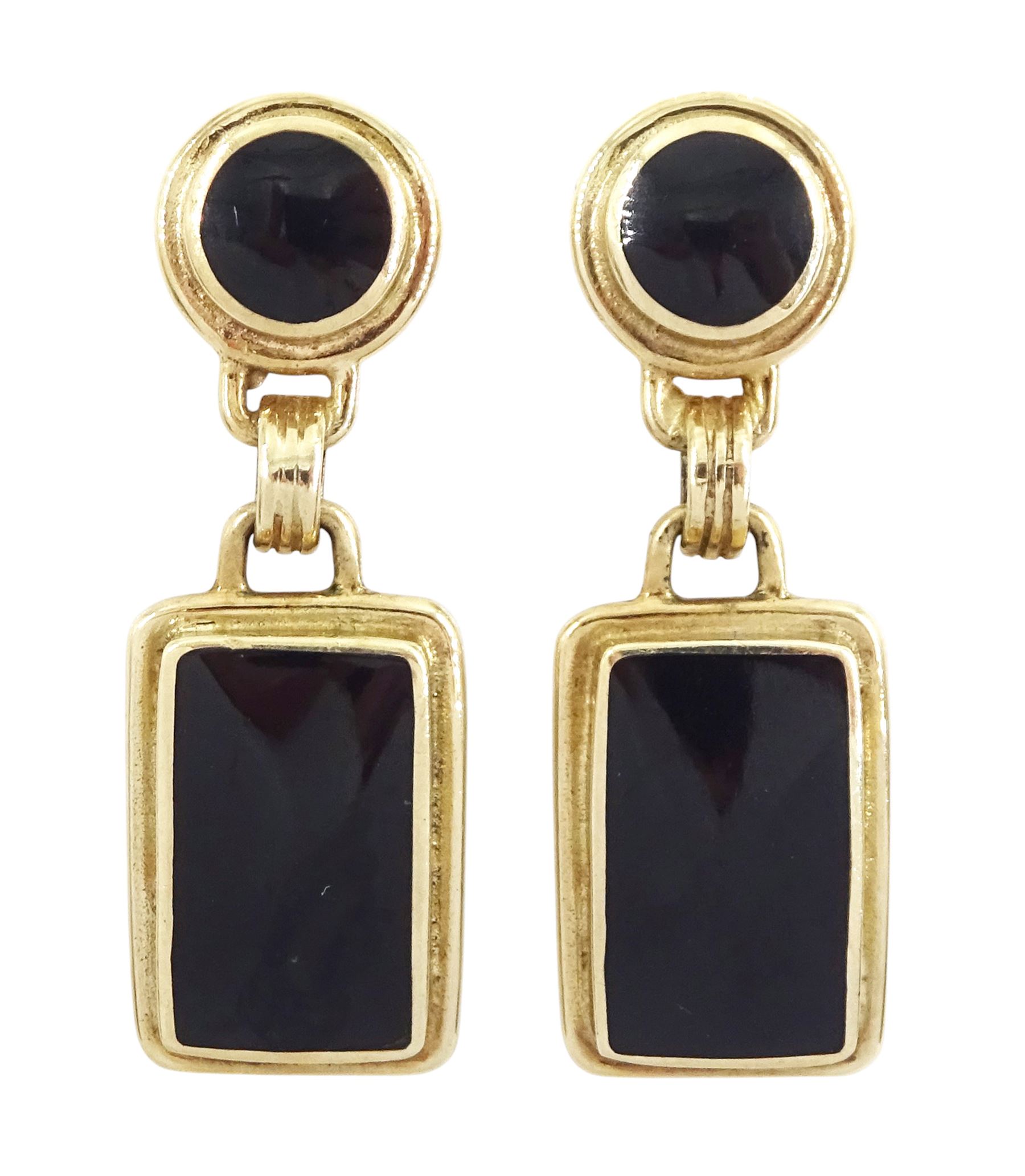 Pair of 9ct gold Whitby jet pendant earrings, each stud set with a round jet piece, suspending a further rectangular jet piece by C W Sellors, Sheffield 1999