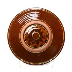 Clive Bowen (1943-): Large slipware charger, in black and orange glazes, unmarked D50cm