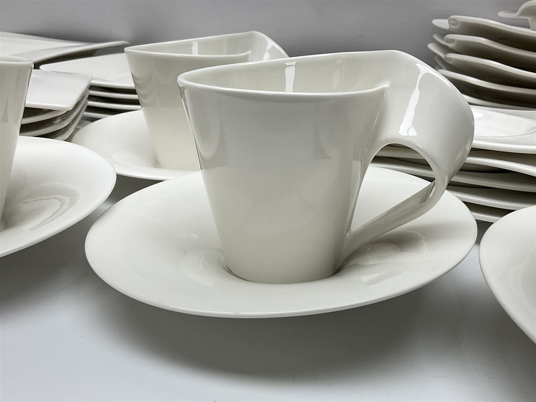 Villeroy & Boch New Wave pattern dinner and tea service for five people, comprising square dinner plates, rectangular dinner plates, pasta bowls, cereal bowls, coffee cups and saucers, side plates and dessert plates, all with printed mark beneath