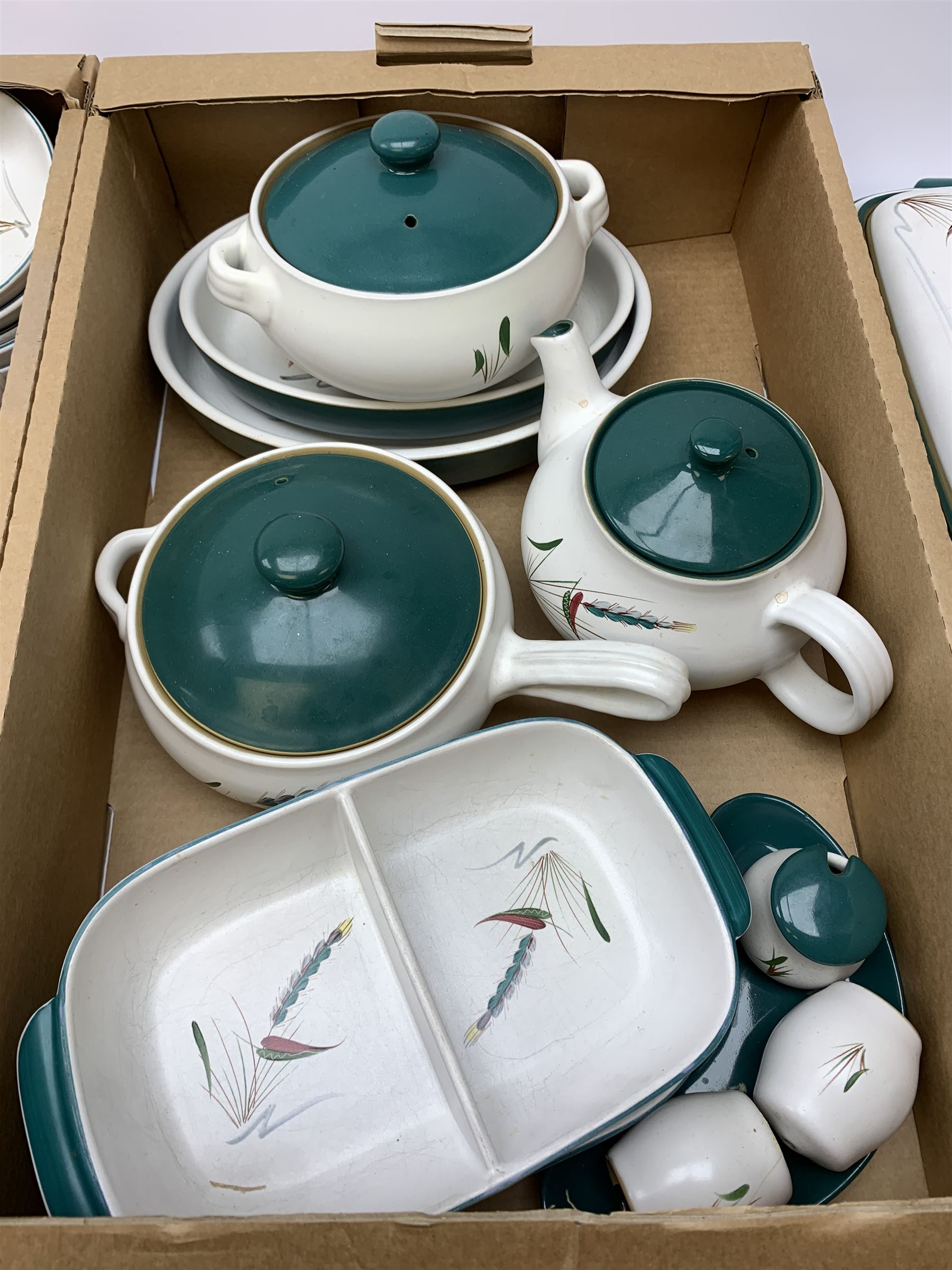 A large quantity of Denby Greenwheat tea and dinner wares, to include
